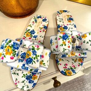 Never worn. Polly Plume Lola bow summer of 69. White w/ floral pattern. Size 39